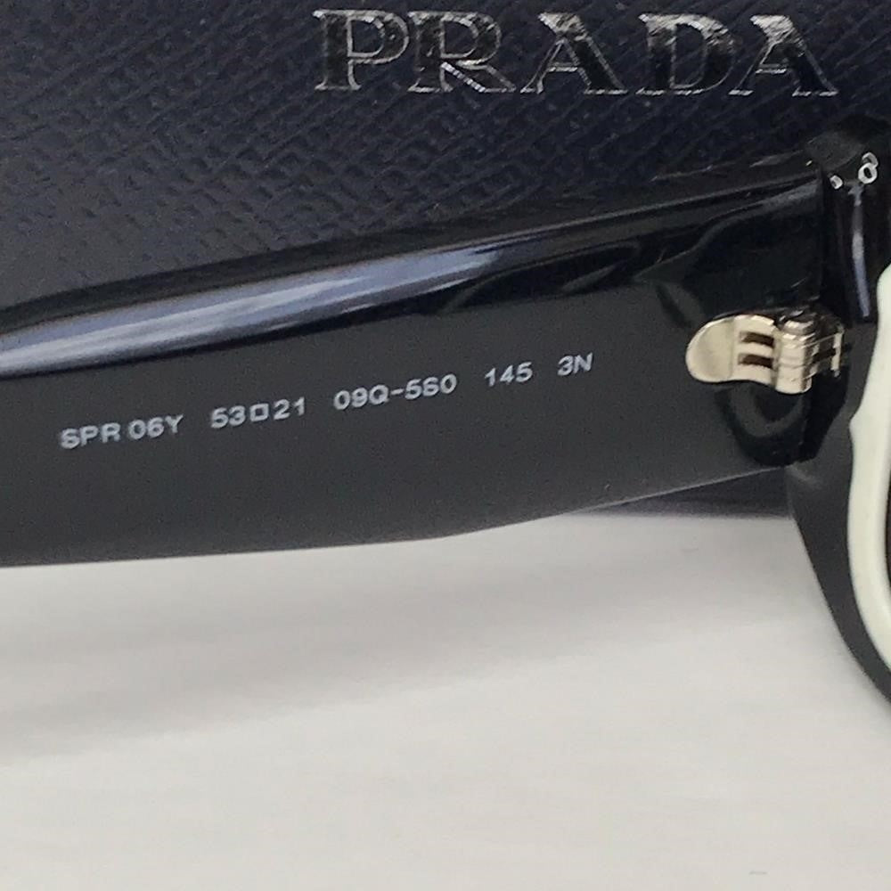 💯 - Authentic New Prada Symbole collection. The bold rectangular frame SPR 0…