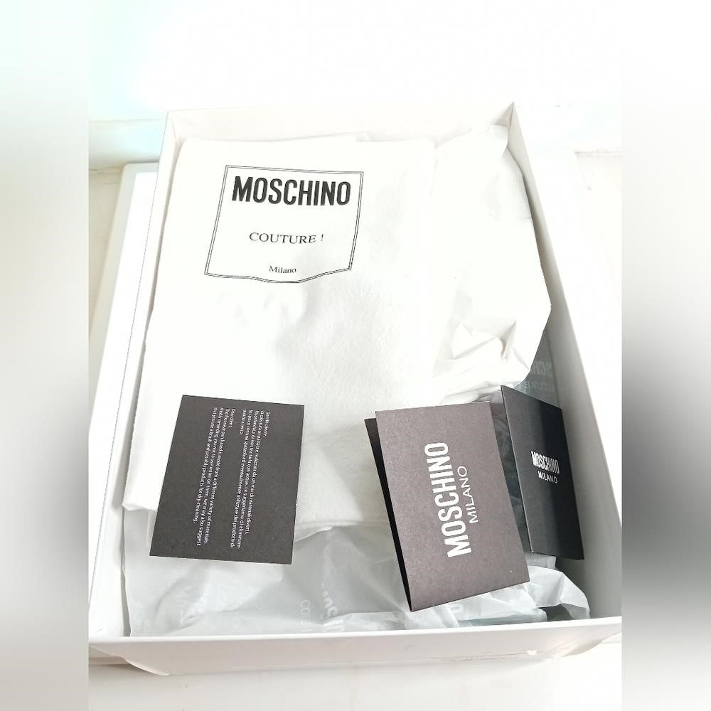 New Moschino Low-Top Logo Sneakers large contrast logo is printed