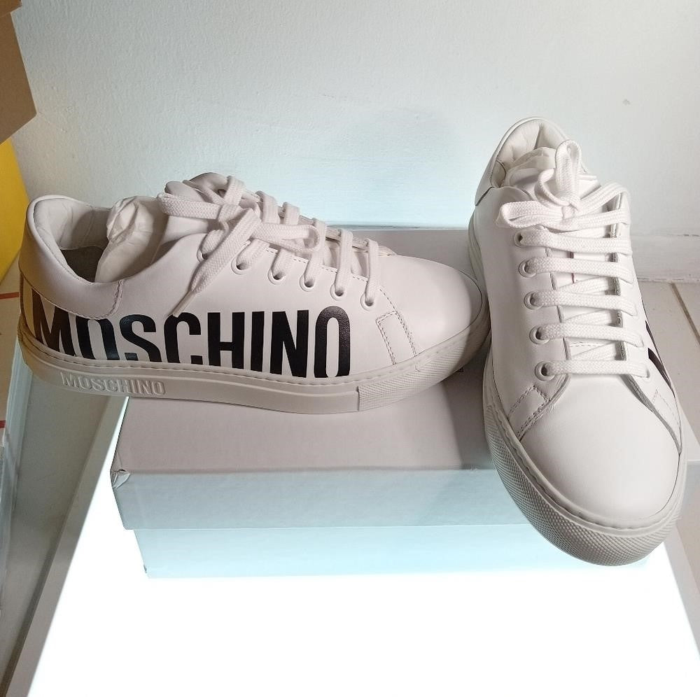 New Moschino Low-Top Logo Sneakers large contrast logo is printed