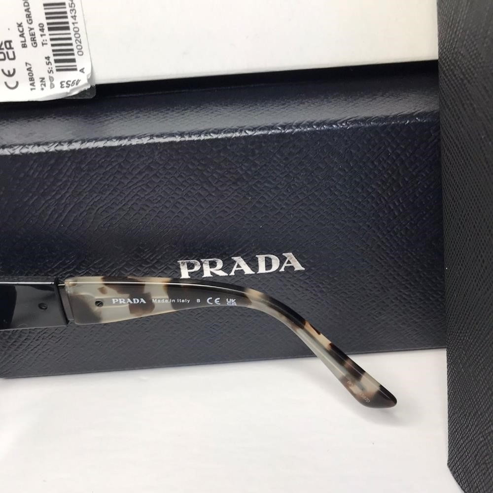 Authentic New Prada sunglasses model PR02WS, black frame variant, color code 1AB