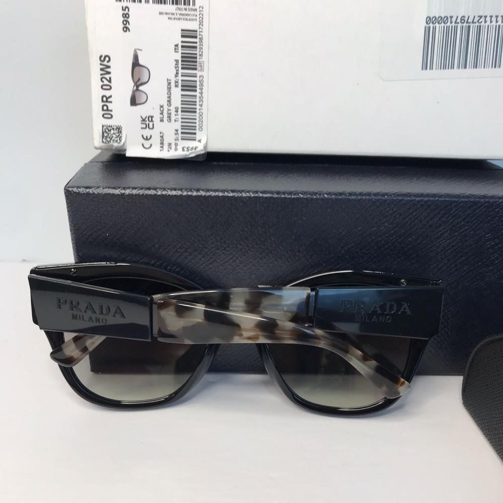 Authentic New Prada sunglasses model PR02WS, black frame variant, color code 1AB