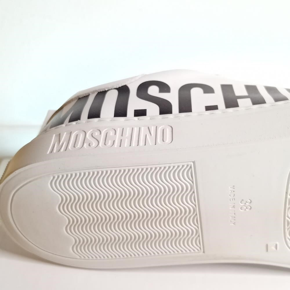 New Moschino Low-Top Logo Sneakers large contrast logo is printed