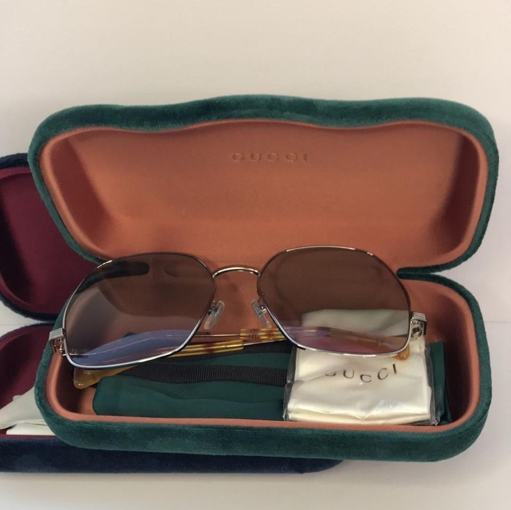 Gucci Logo GG0972S 004 blue to cherry red lens.sunglasses