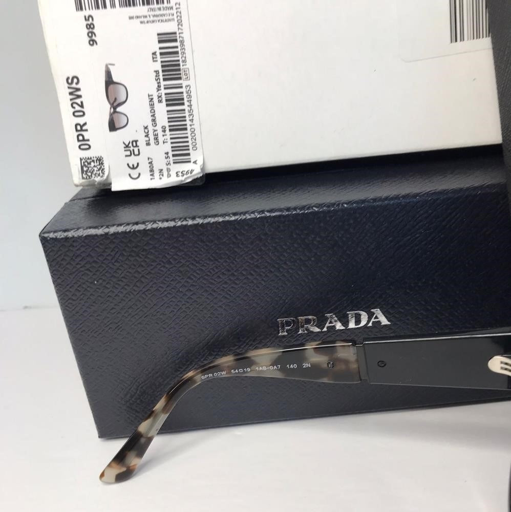 Authentic New Prada sunglasses model PR02WS, black frame variant, color code 1AB